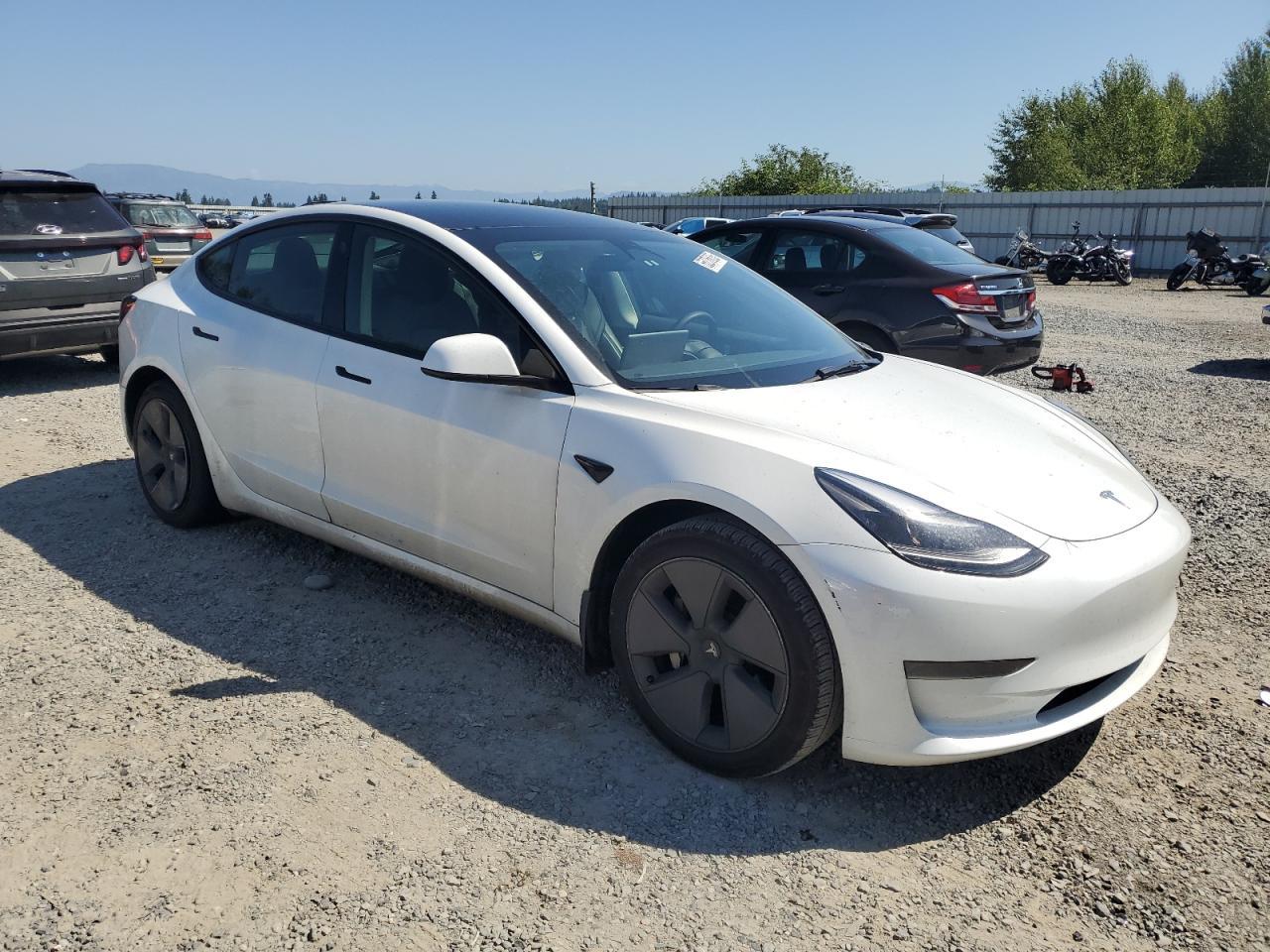 2023 Tesla Model 3 - Фото 4