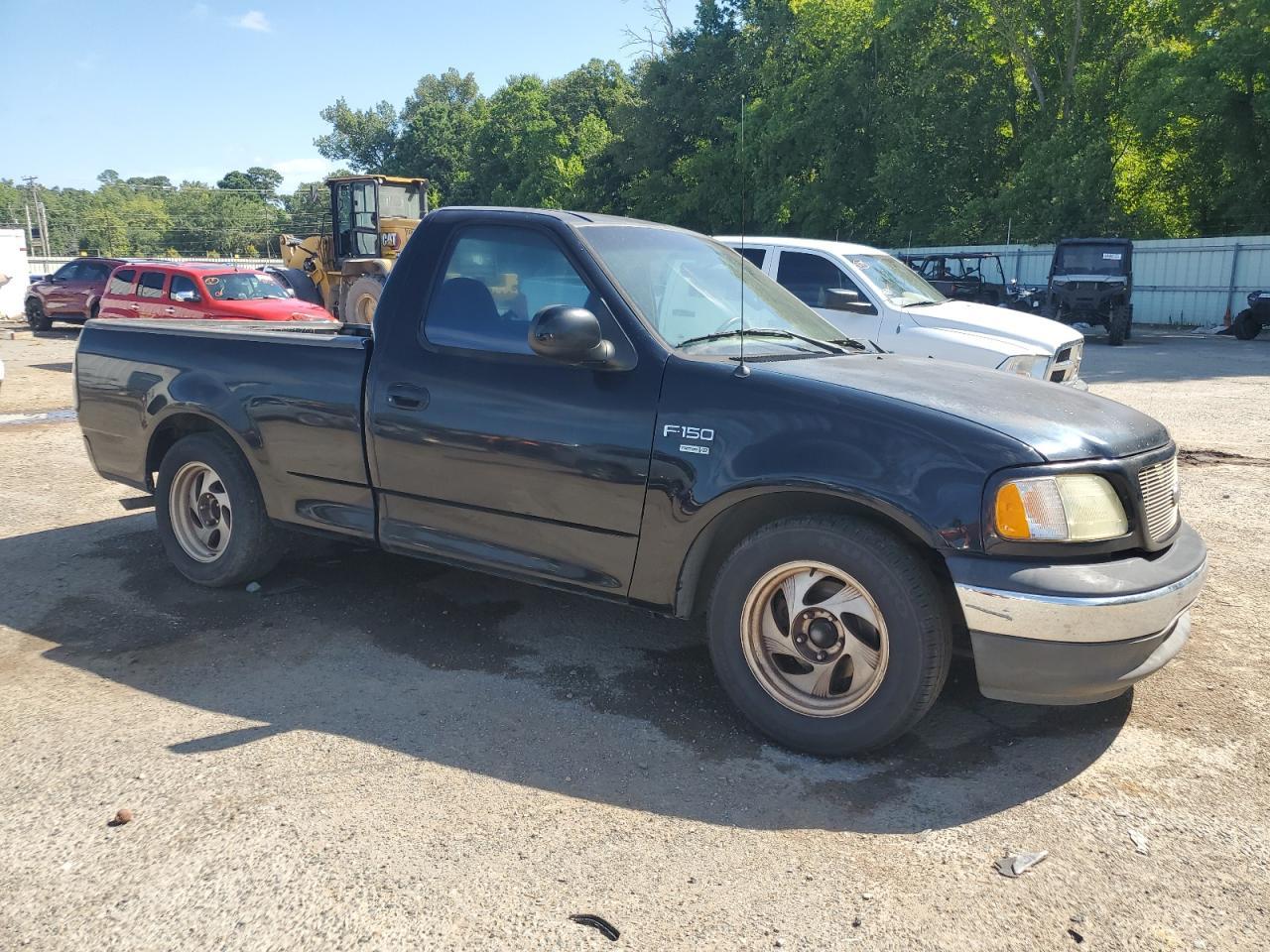 2002 Ford F150 - Фото 4