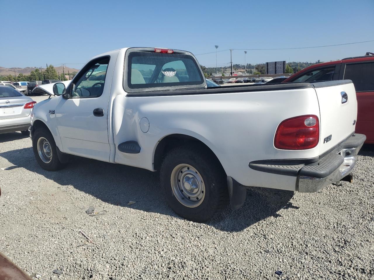 2003 Ford F150 - Фото 2