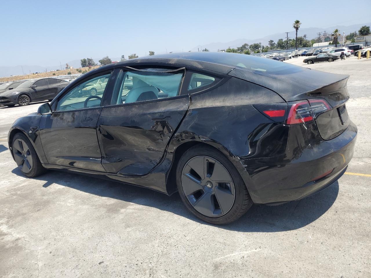 2023 Tesla Model 3 - Фото 2
