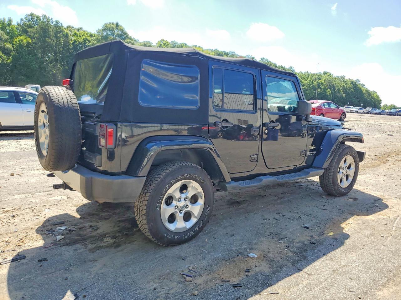 2014 Jeep Wrangler Unlimited Sahara - Фото 3