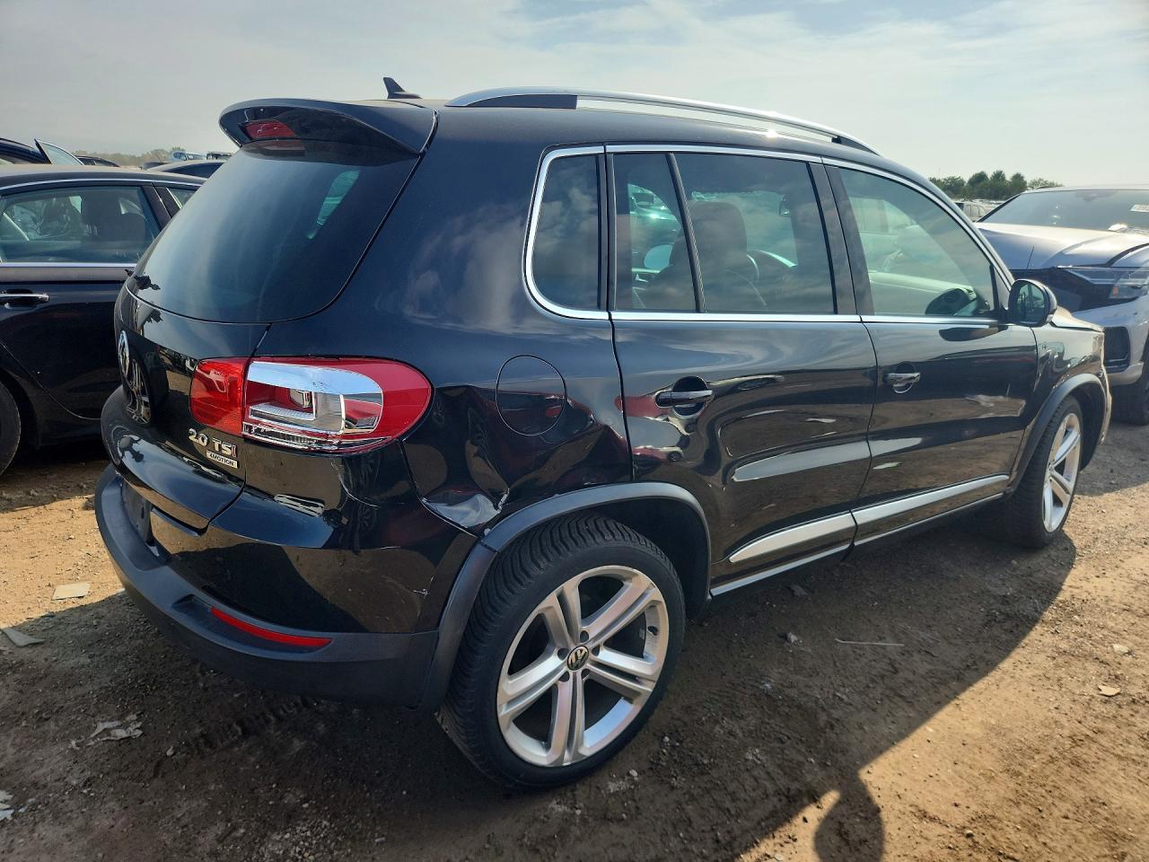 2014 Volkswagen Tiguan S - Фото 3