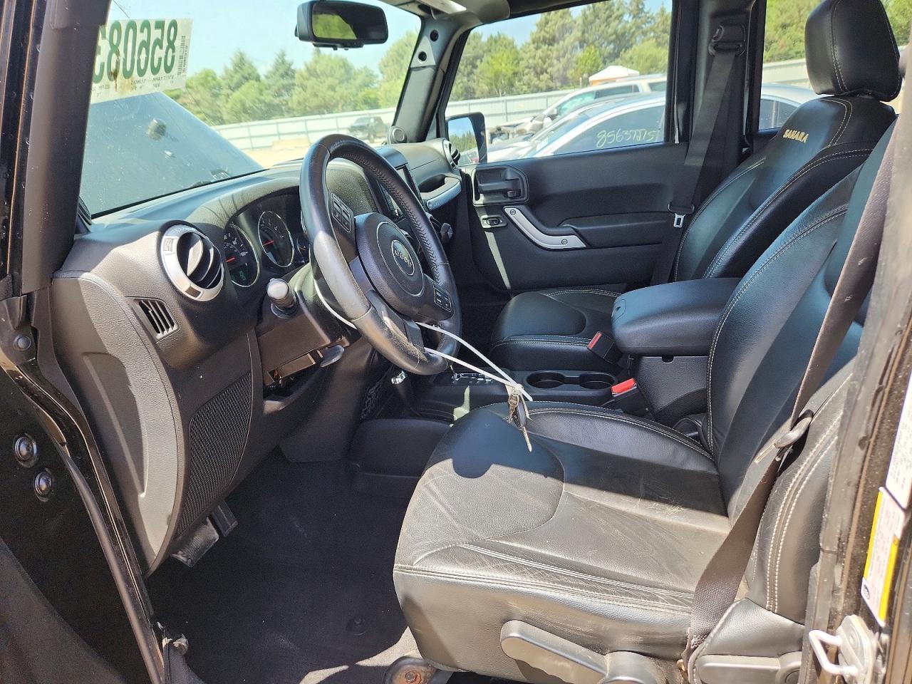 2014 Jeep Wrangler Unlimited Sahara - Фото 7