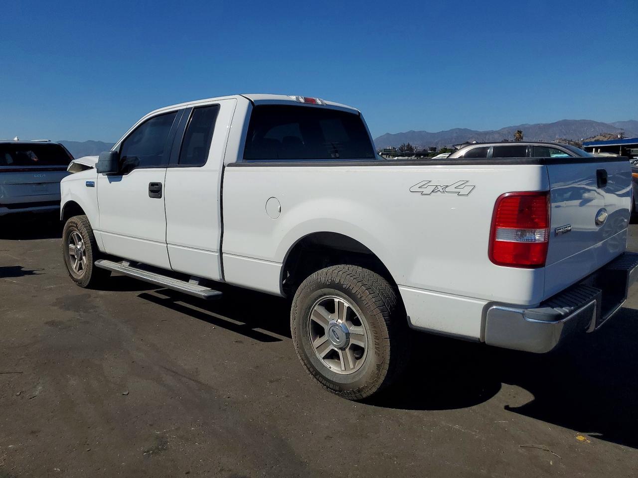2006 Ford F150 - Фото 2