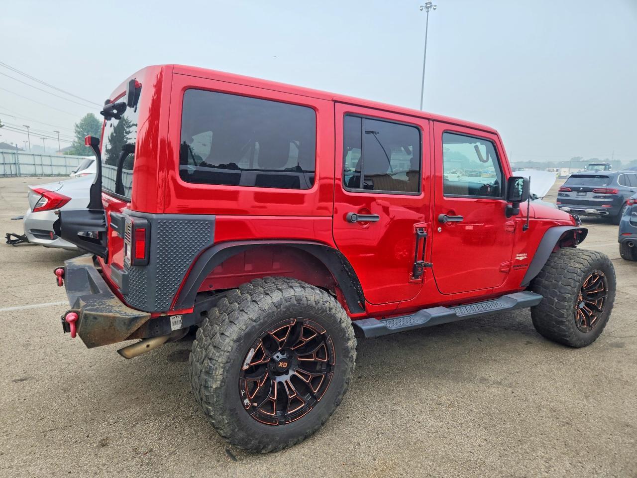 2014 Jeep Wrangler Unlimited Sahara - Фото 3