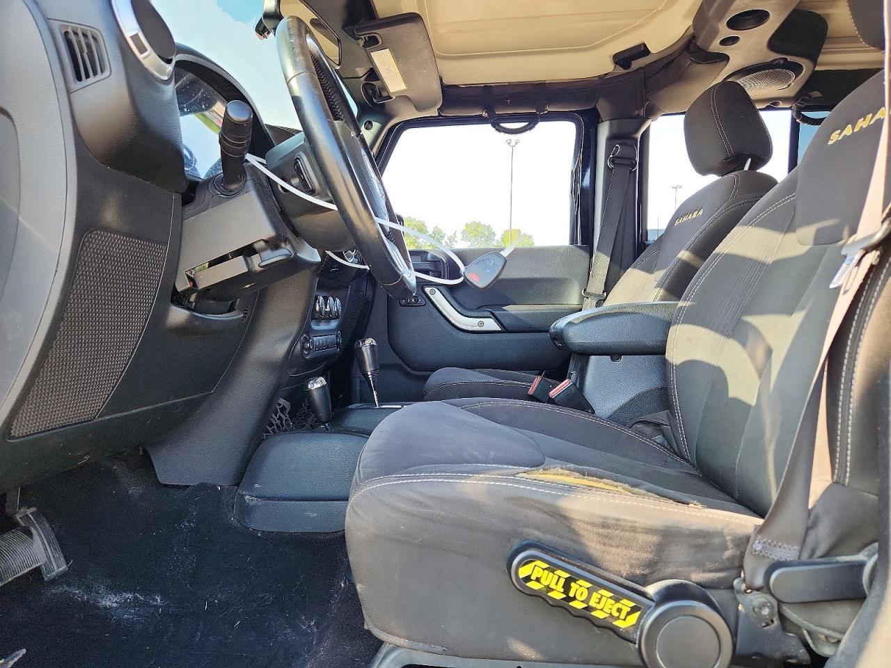 2014 Jeep Wrangler Unlimited Sahara - Фото 7