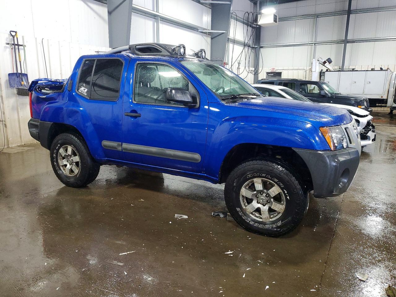 2012 Nissan Xterra X - Image 4