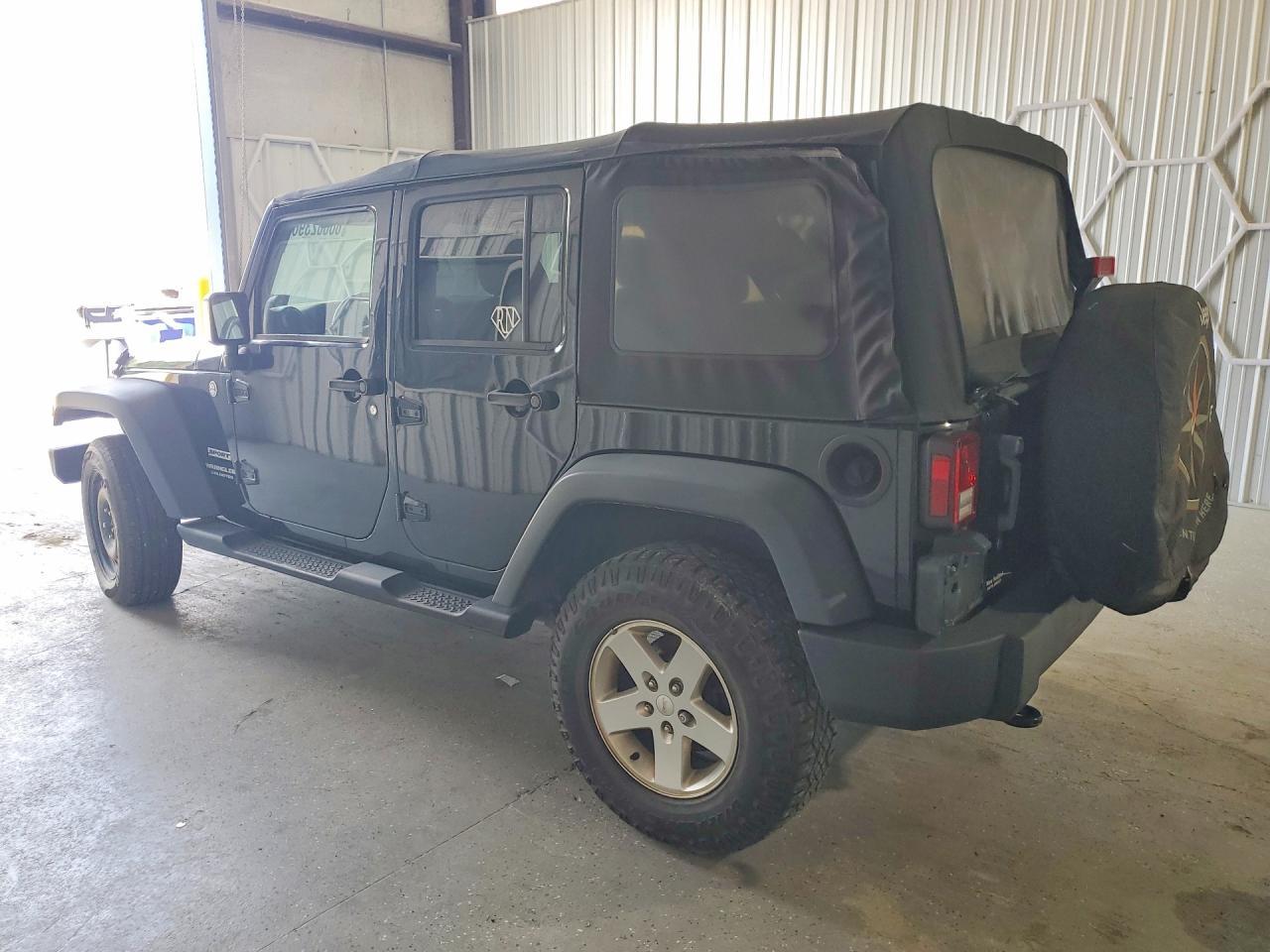 2014 Jeep Wrangler Unlimited Sport - Фото 2