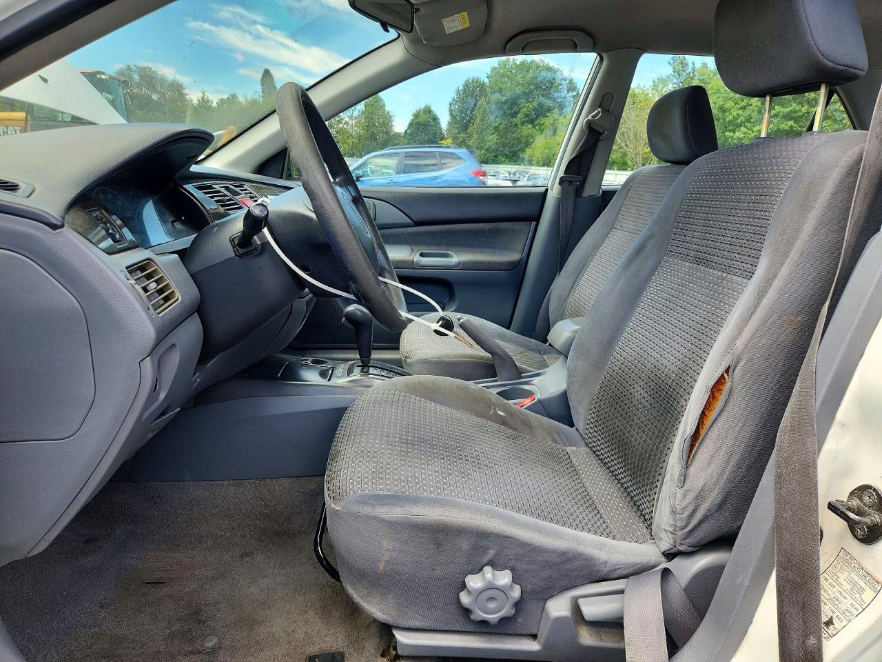 2002 Mitsubishi Lancer Es - Фото 7