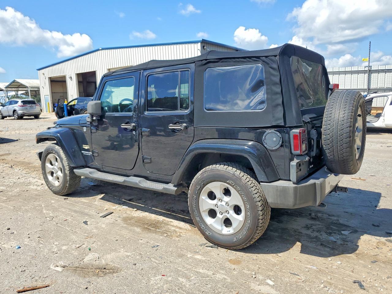 2014 Jeep Wrangler Unlimited Sahara - Фото 2