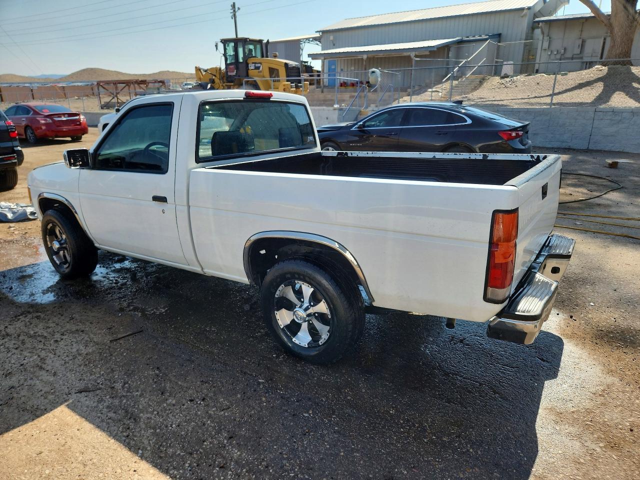 1995 Nissan Truck E/Xe - Фото 2