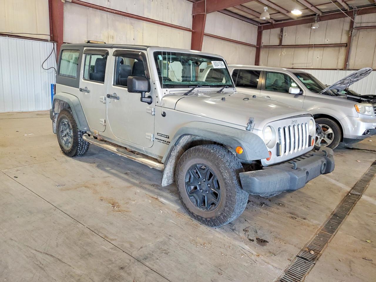 2011 Jeep Wrangler Unlimited Sport - Фото 4