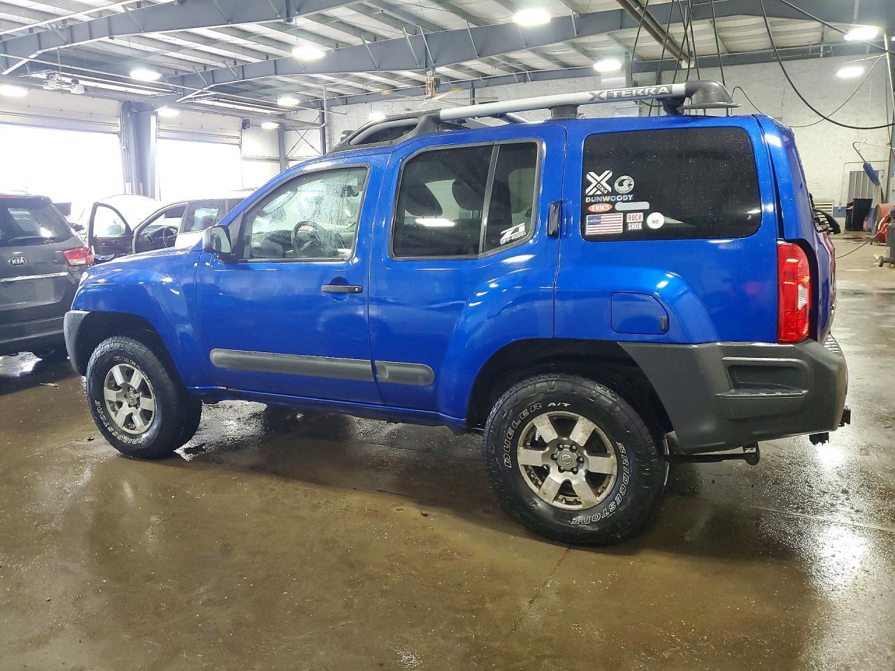 2012 Nissan Xterra X - Image 2