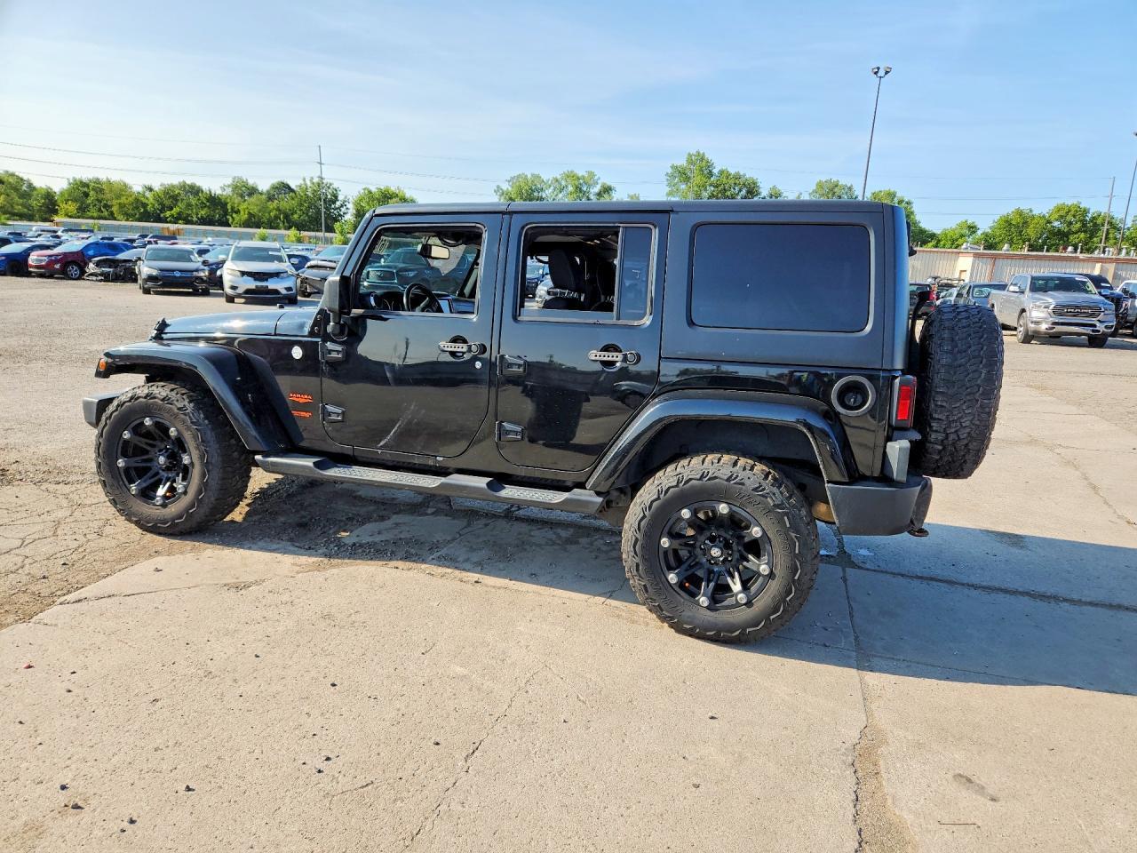 2014 Jeep Wrangler Unlimited Sahara - Фото 2
