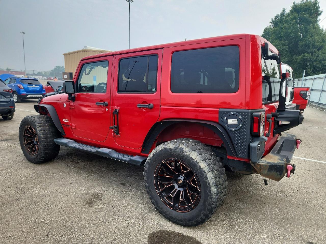 2014 Jeep Wrangler Unlimited Sahara - Фото 2