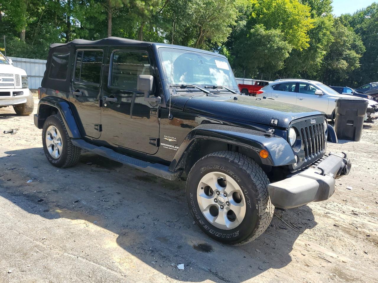 2014 Jeep Wrangler Unlimited Sahara - Фото 4
