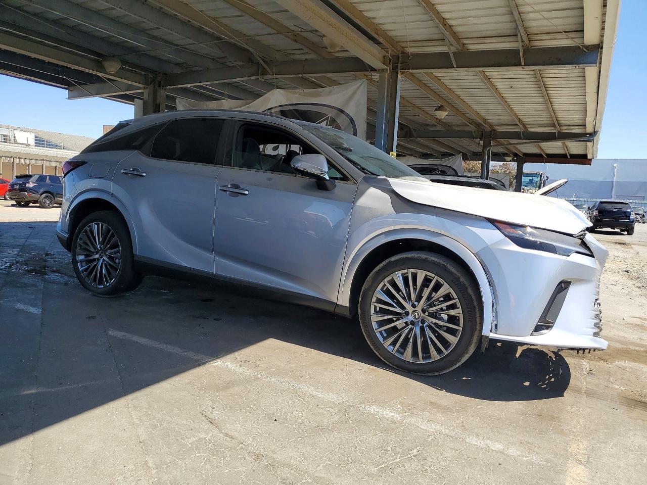 2024 Lexus Rx 450H+ Luxury - Фото 4