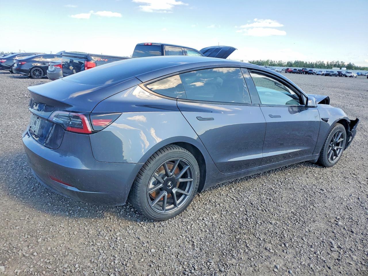 2023 Tesla Model 3 - Фото 3