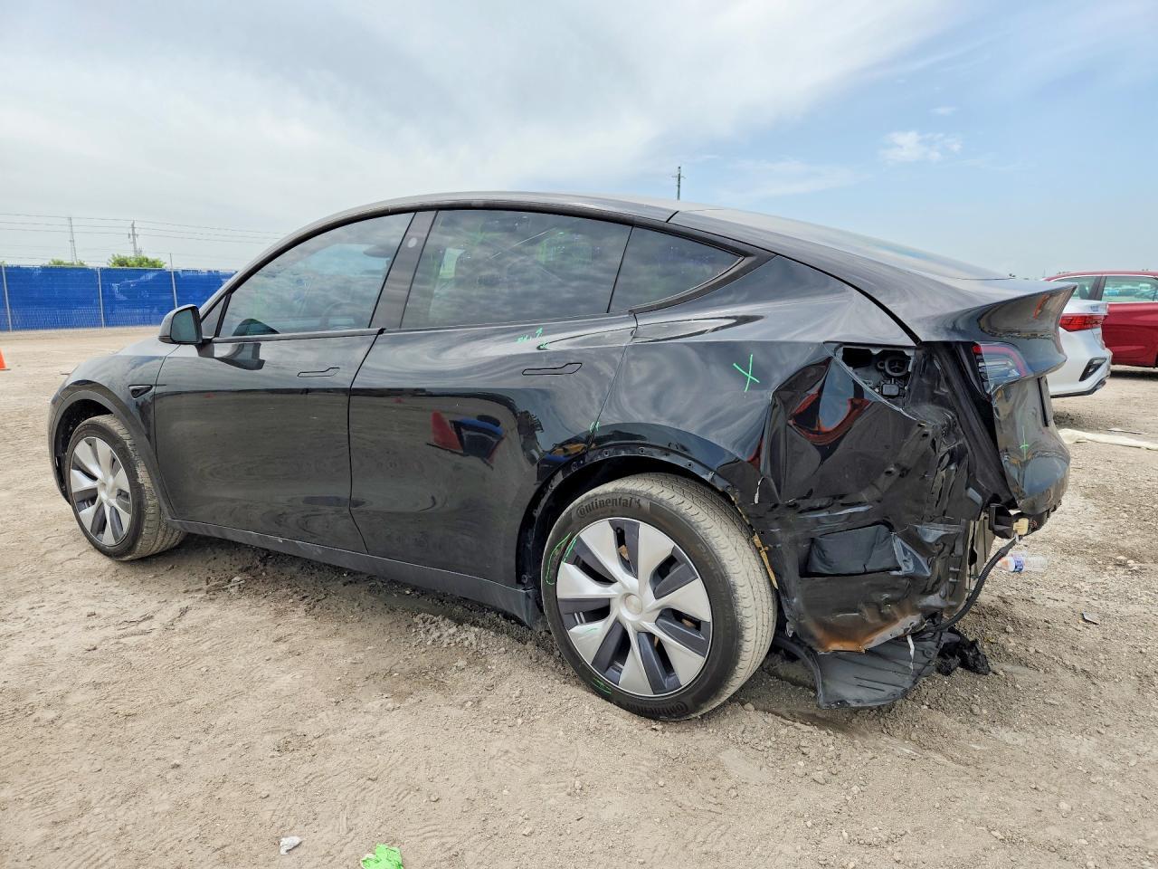 2024 Tesla Model Y - Фото 2