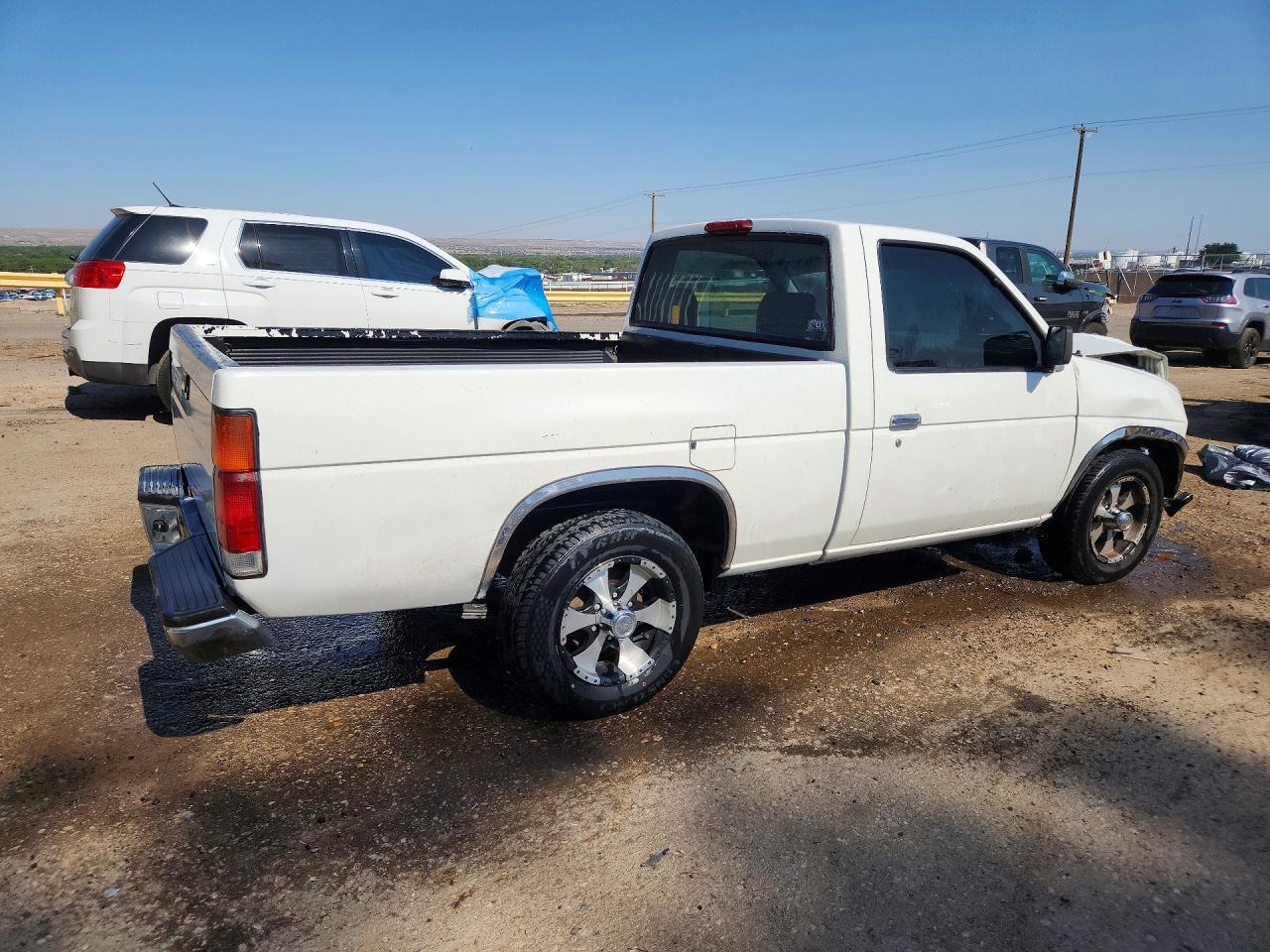 1995 Nissan Truck E/Xe - Фото 3