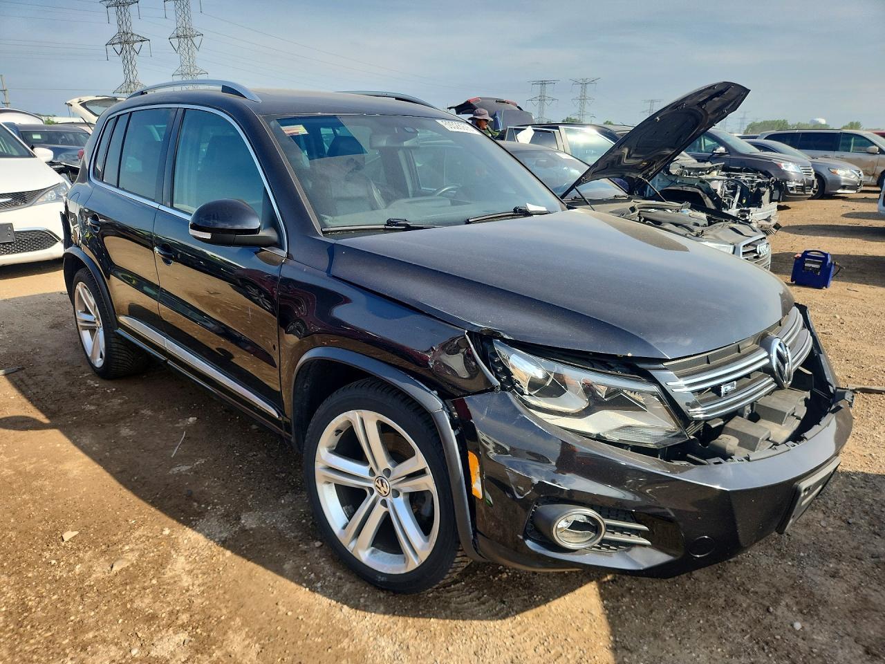 2014 Volkswagen Tiguan S - Фото 4