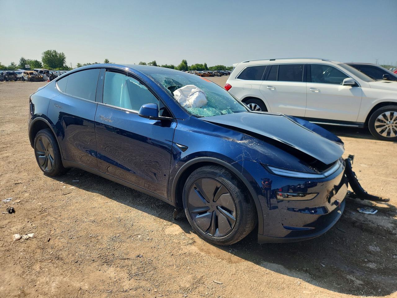 2026 Tesla Model Y - Фото 4