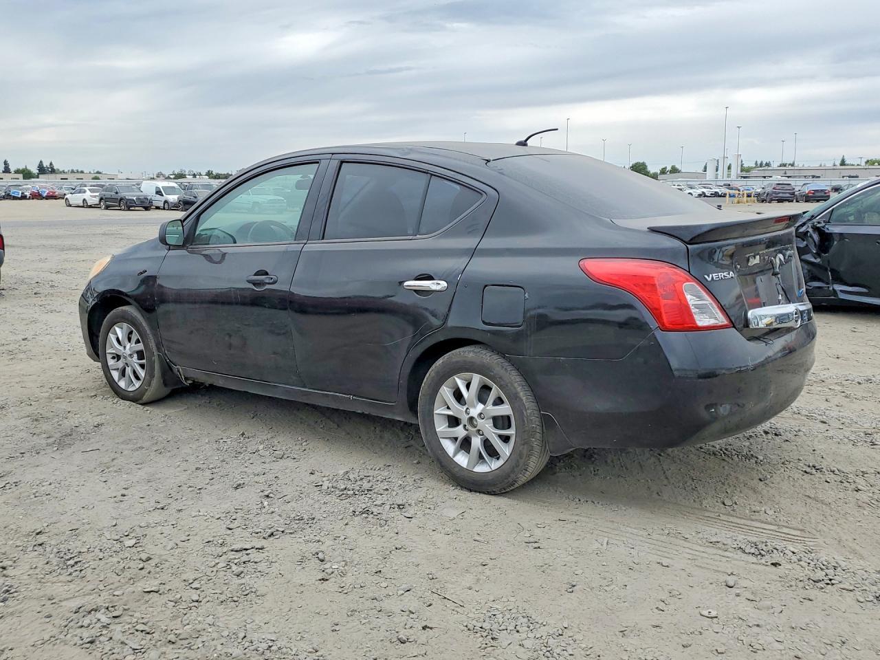 2014 Nissan Versa 1.6 S Plus - Фото 2