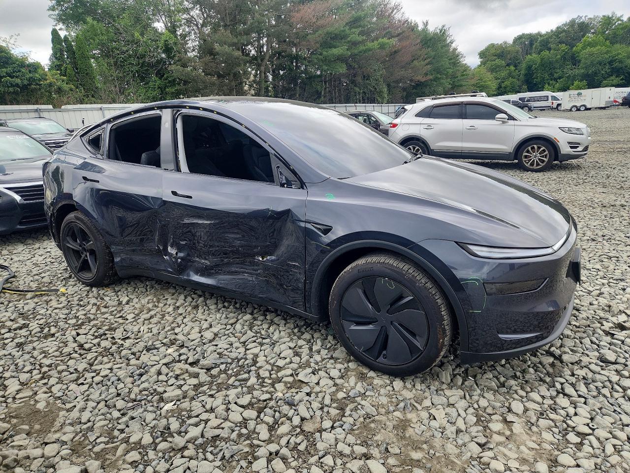 2026 Tesla Model Y - Фото 4