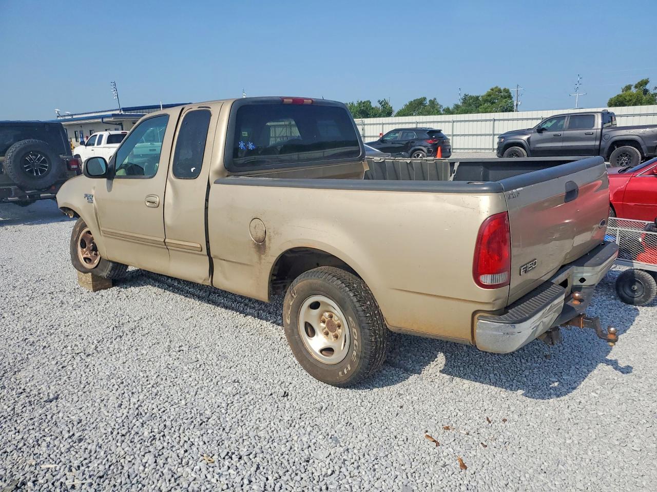 1999 Ford F150 - Фото 2