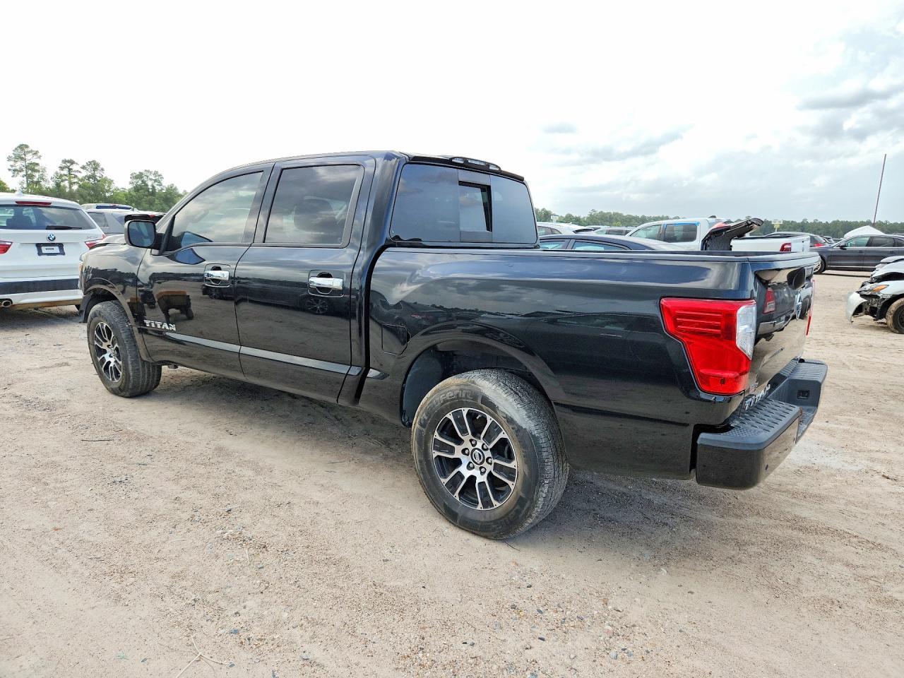 2021 Nissan Titan Sv - Фото 2