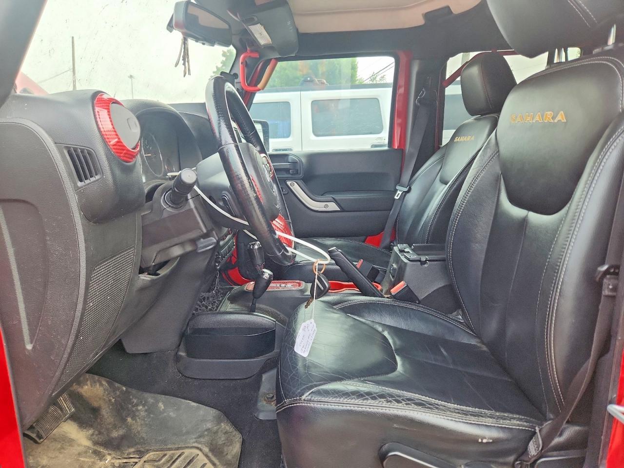 2014 Jeep Wrangler Unlimited Sahara - Фото 7