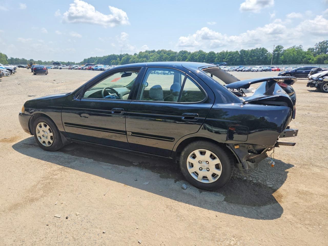 2001 Nissan Sentra Xe - Фото 2