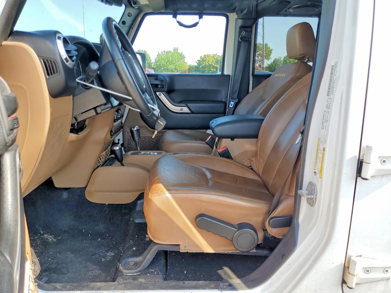 2014 Jeep Wrangler Unlimited Sahara - Фото 7