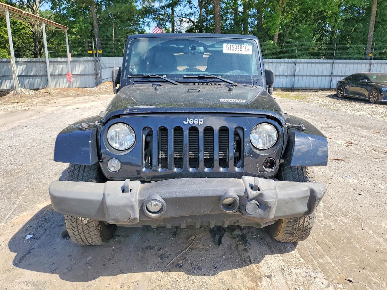 2014 Jeep Wrangler Unlimited Sahara - Фото 5