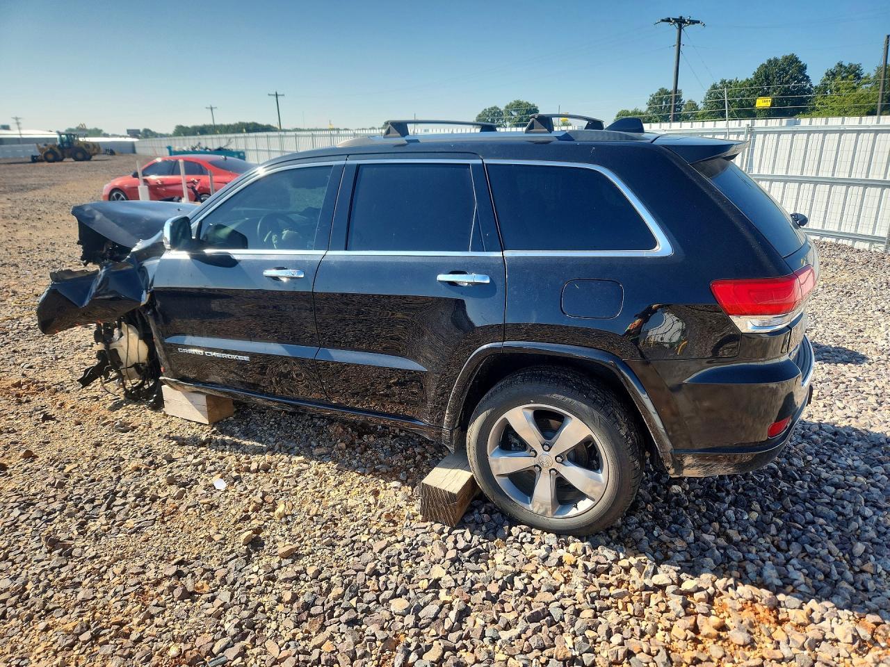 2014 Jeep Grand Cherokee - Фото 2