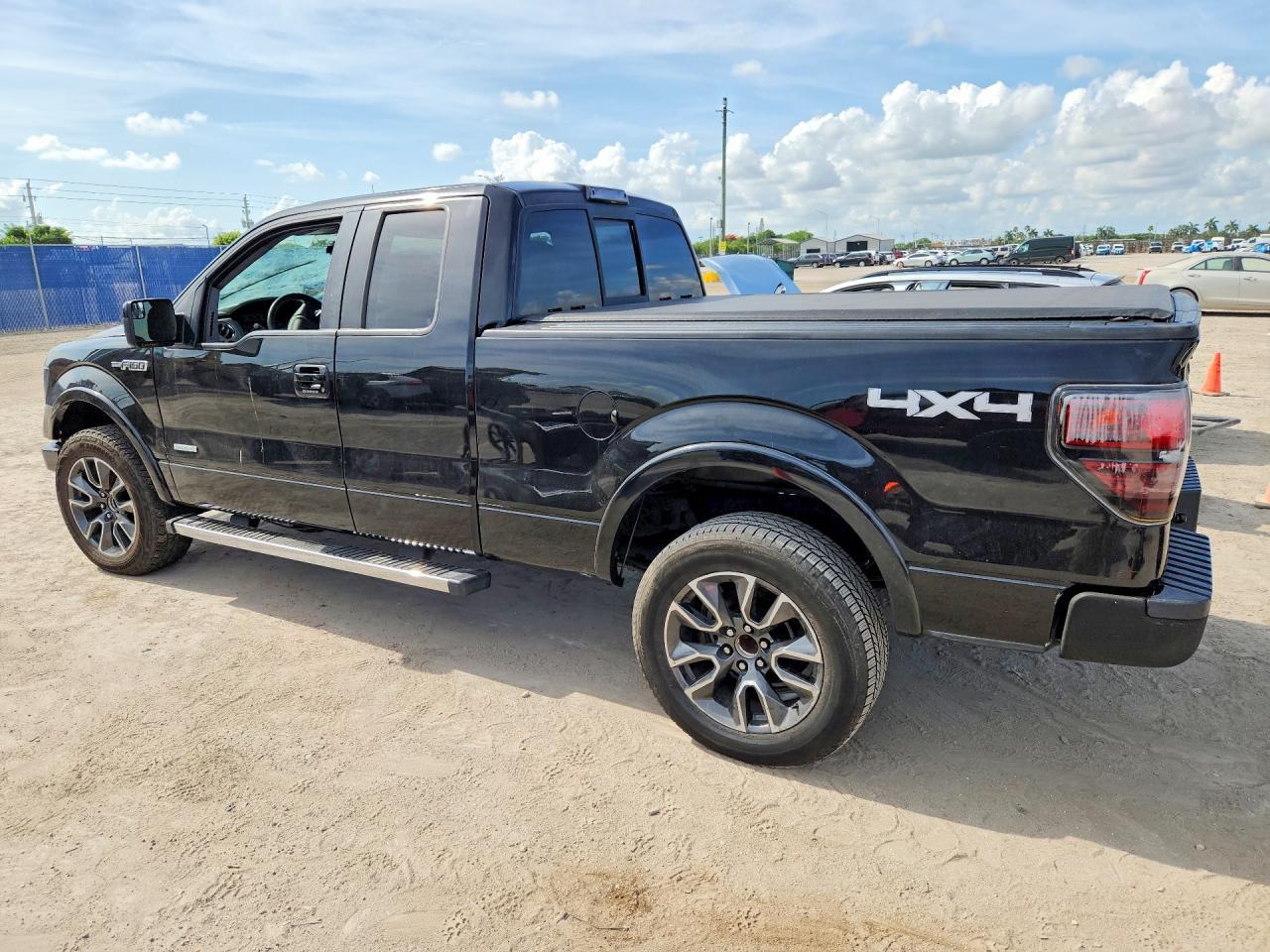 2013 Ford F150 Super Cab - Image 2