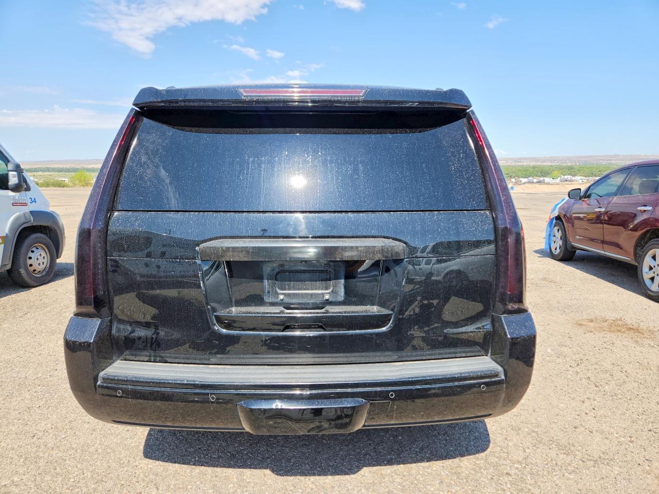 2015 GMC Yukon Denali - Фото 6