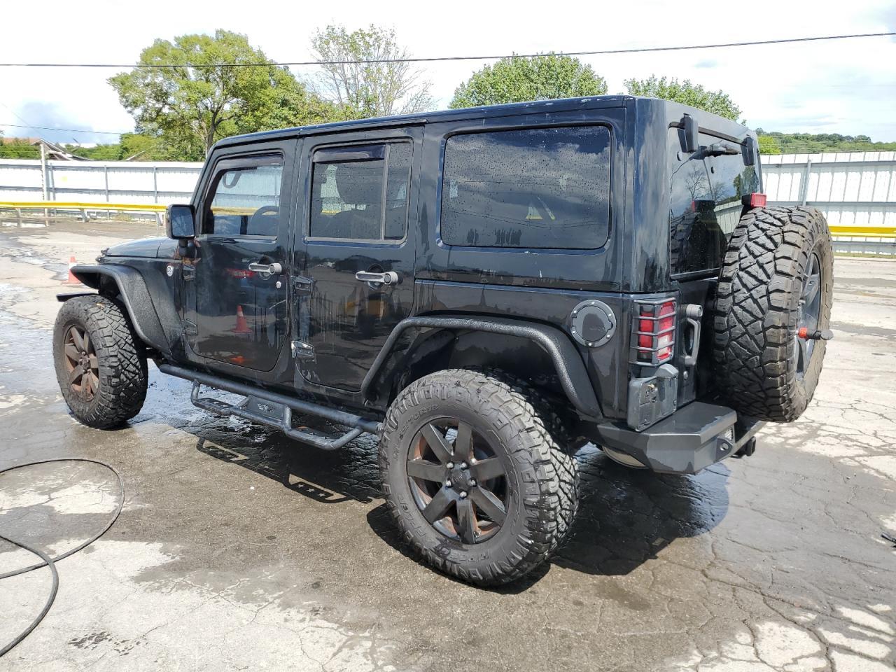 2014 Jeep Wrangler Unlimited Sahara - Фото 2