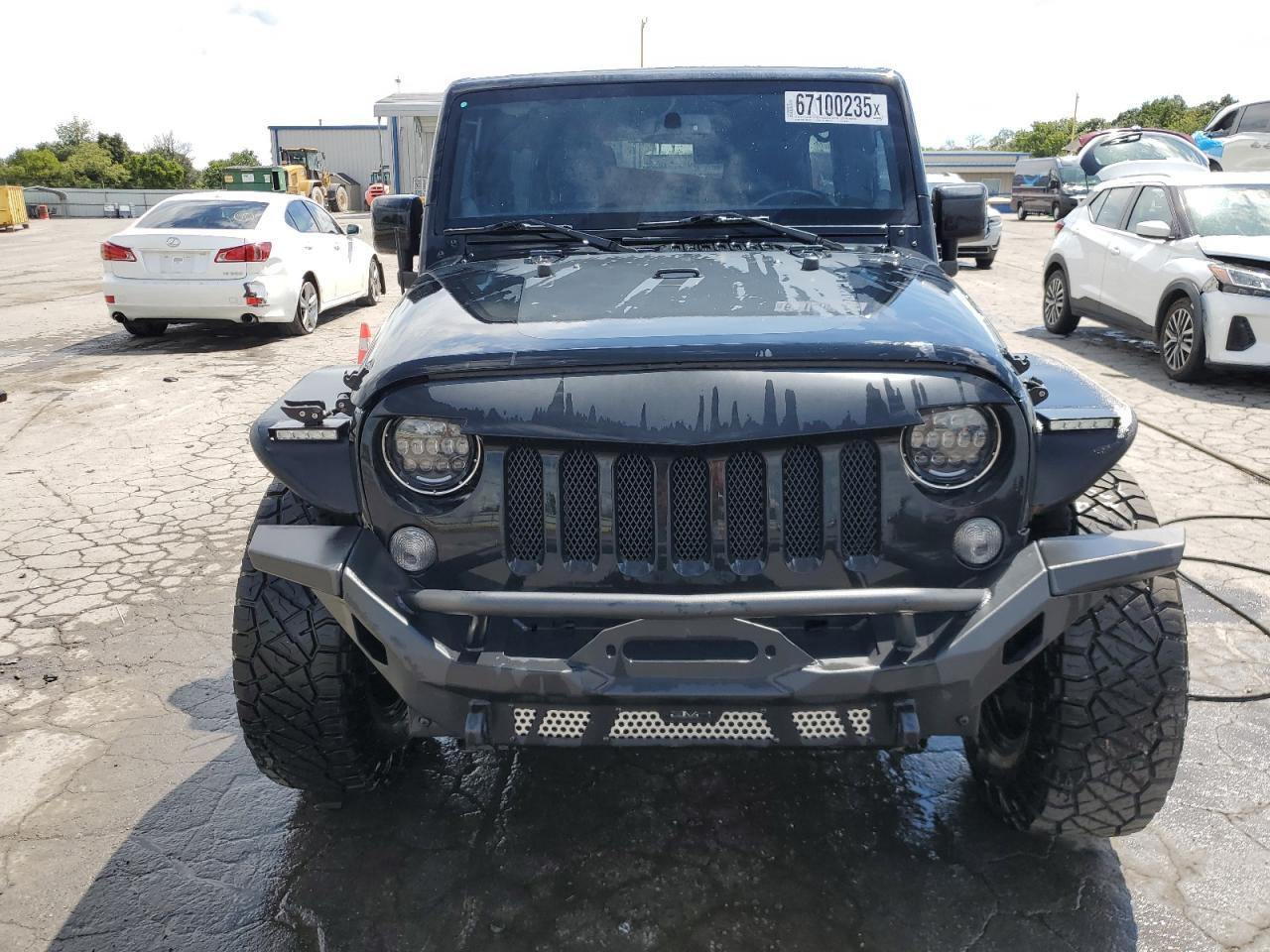 2014 Jeep Wrangler Unlimited Sahara - Фото 5