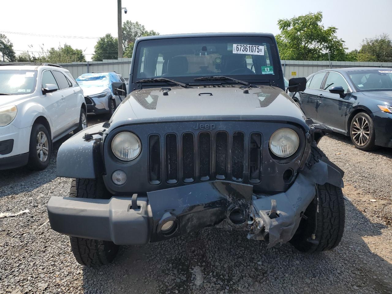 2014 Jeep Wrangler Unlimited Sahara - Image 5