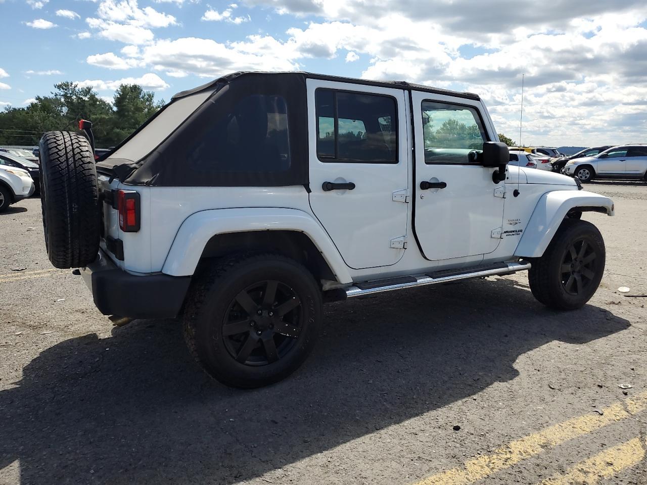 2013 Jeep Wrangler Unlimited Sahara - Фото 3