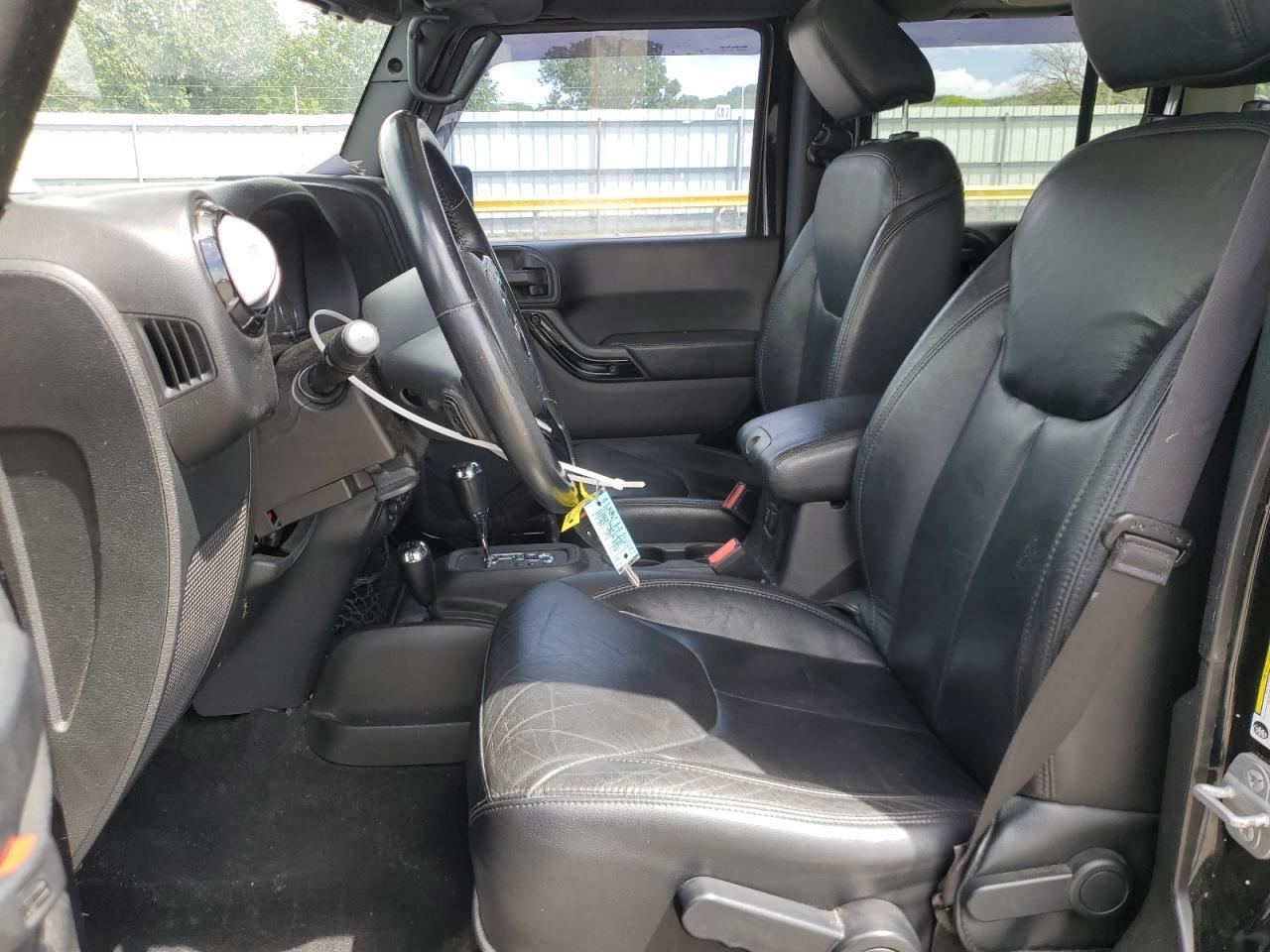 2014 Jeep Wrangler Unlimited Sahara - Фото 7