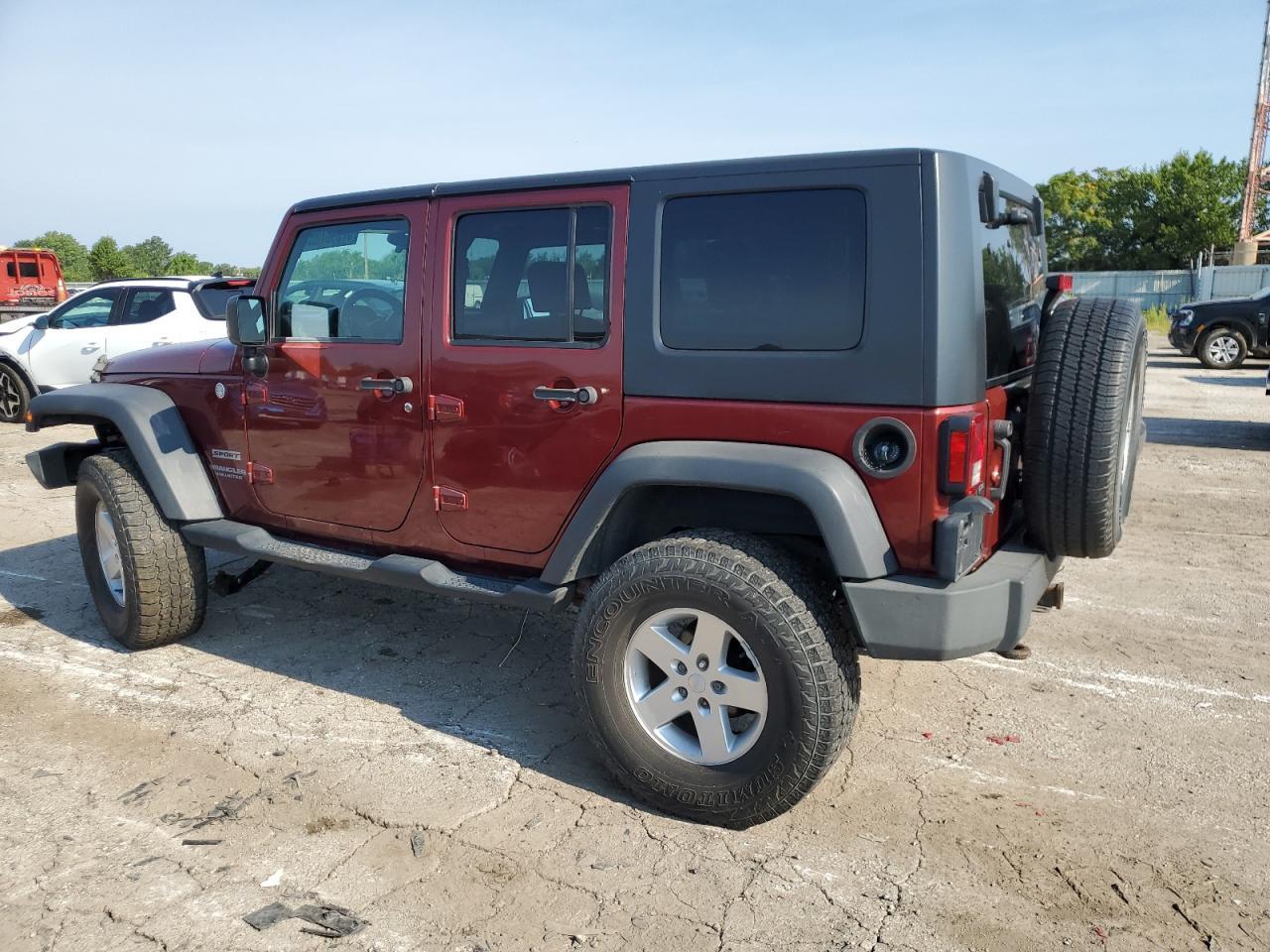 2010 Jeep Wrangler Unlimited Sport - Фото 2
