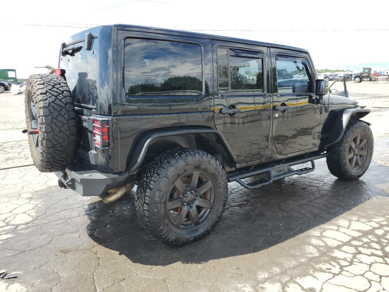 2014 Jeep Wrangler Unlimited Sahara - Фото 3