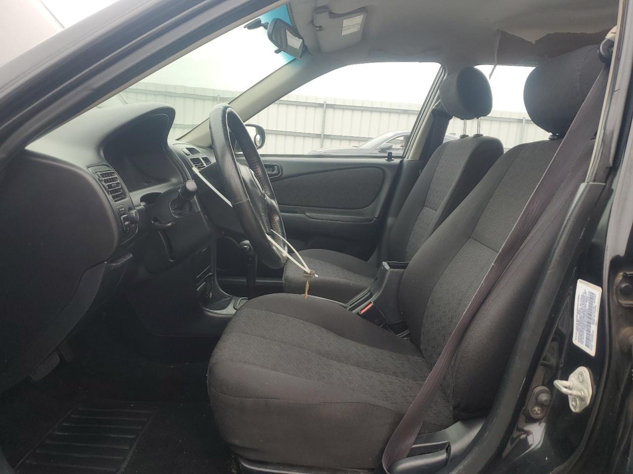 2002 Toyota Corolla Ce - Фото 7