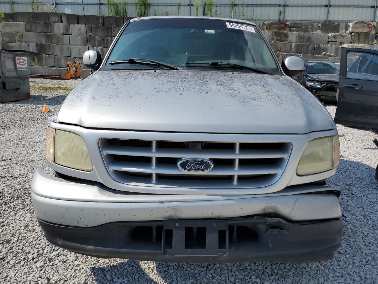 2002 Ford F150 - Фото 5