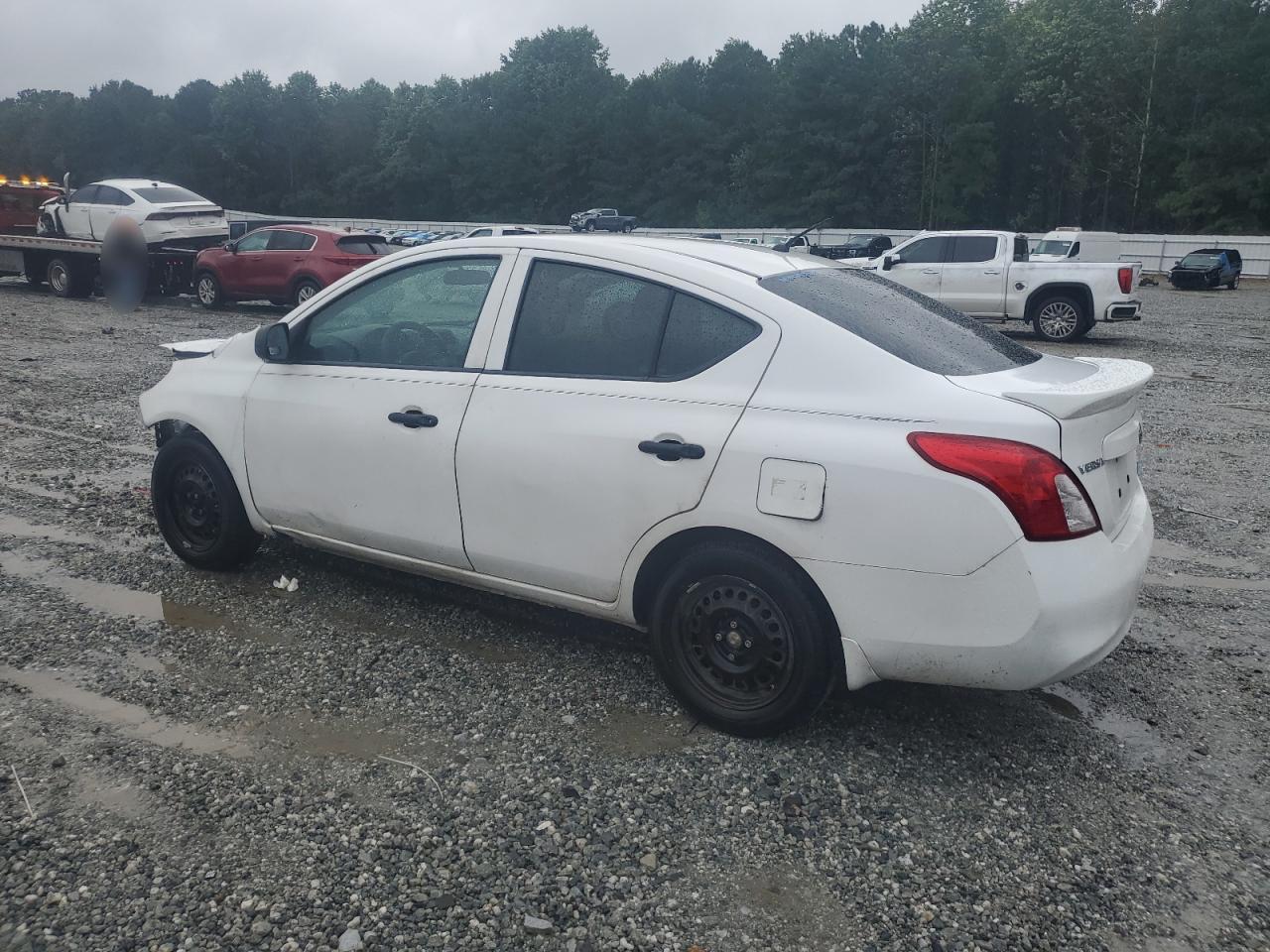 2014 Nissan Versa S - Фото 2