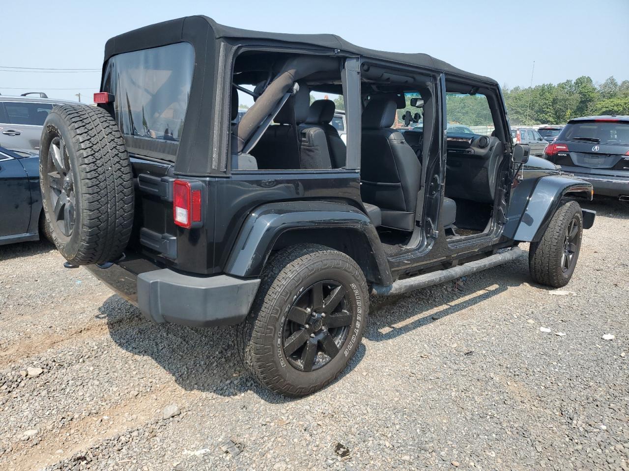 2014 Jeep Wrangler Unlimited Sahara - Image 3