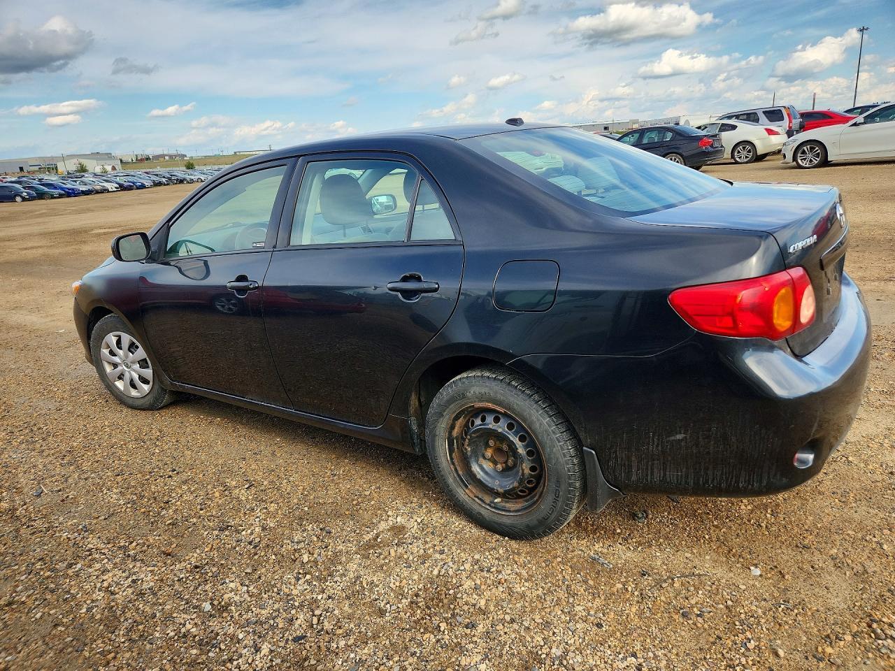 2010 Toyota Corolla Base - Фото 2