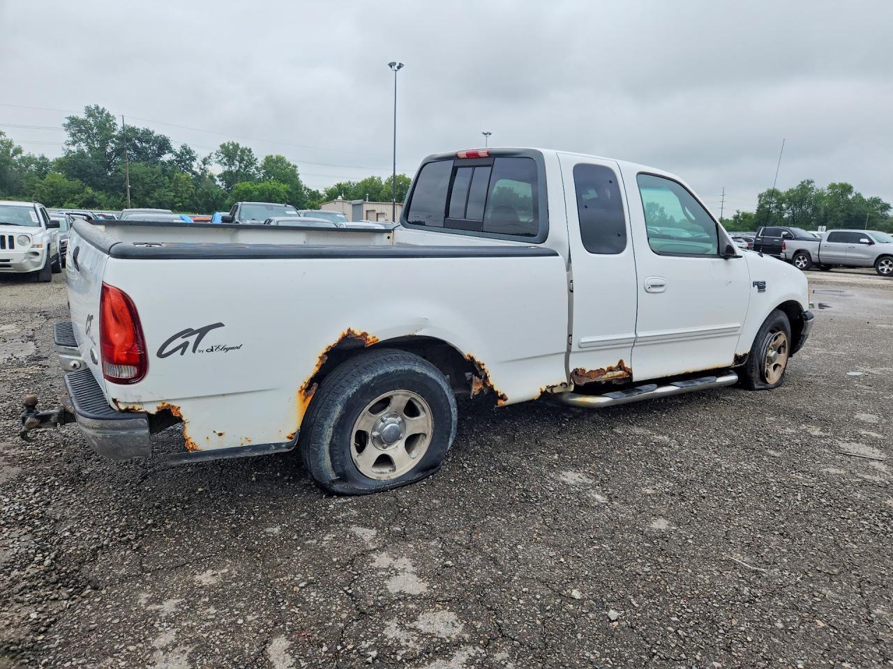 2000 Ford F150 - Фото 3